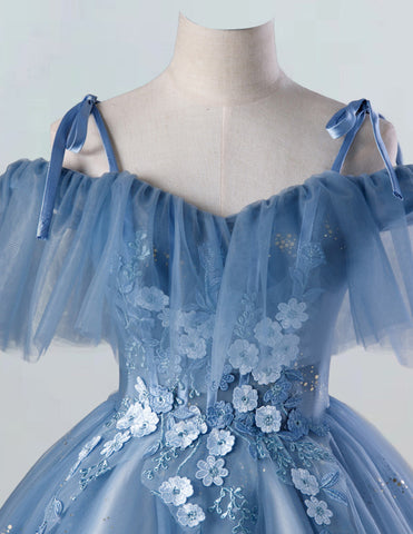 a dress on a mannequin with flowers on it a dress on a mannequin with flowers on it