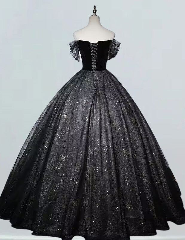 a black ball gown on a mannequin a black ball gown on a mannequin