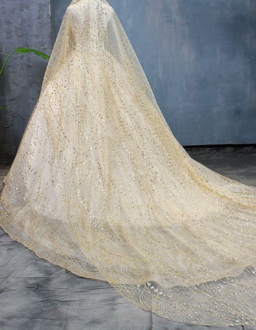 Strapless champagne sequine tulle ball gown