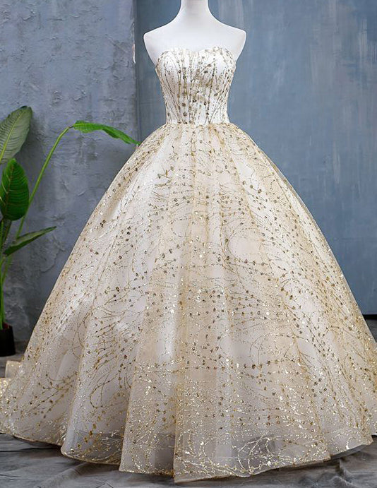 Strapless champagne sequine tulle ball gown