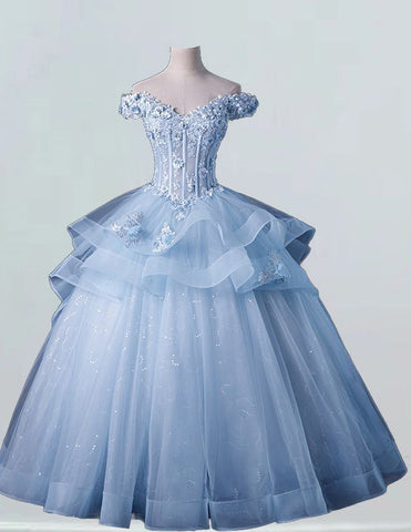 a blue ball gown on a mannequin