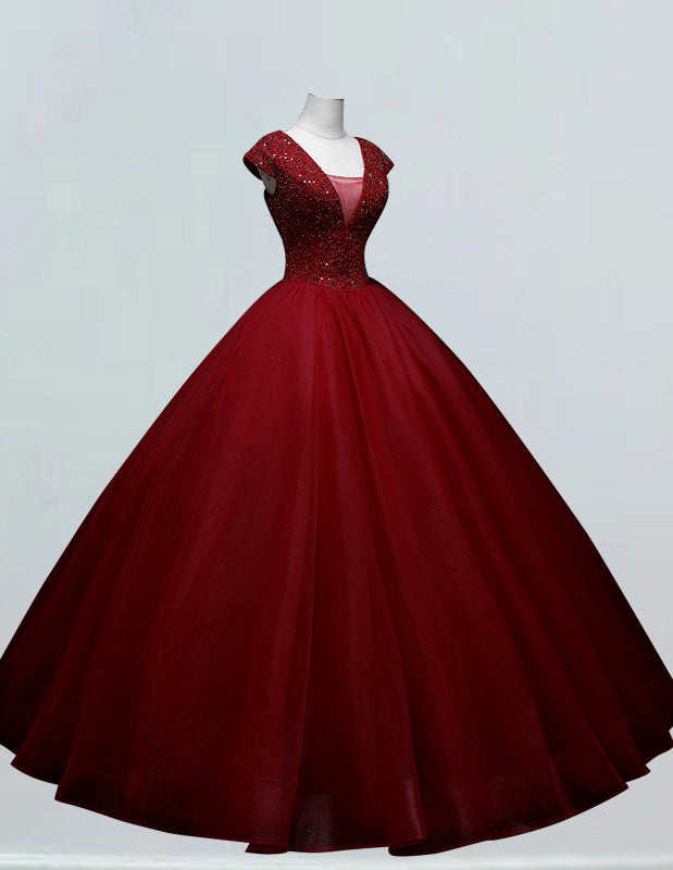 a red ball gown on a mannequin