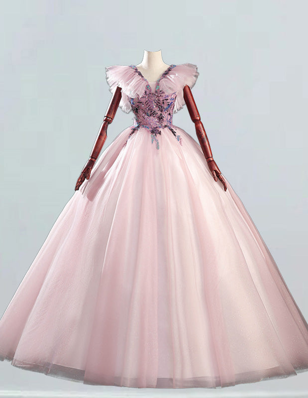 a pink ball gown on a mannequin