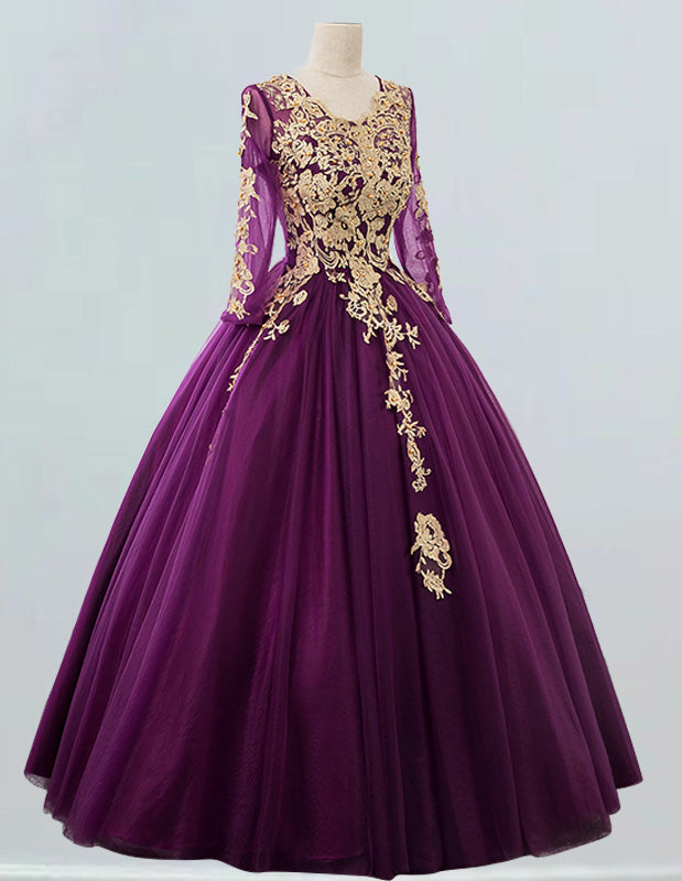 a purple ball gown with gold appliques