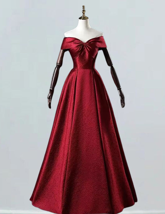 a red evening gown on a mannequin