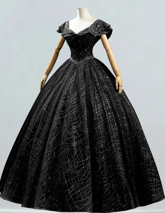 a mannequin wearing a black ball gown