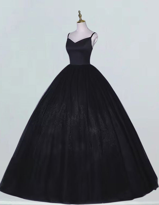 a black ball gown on a mannequin