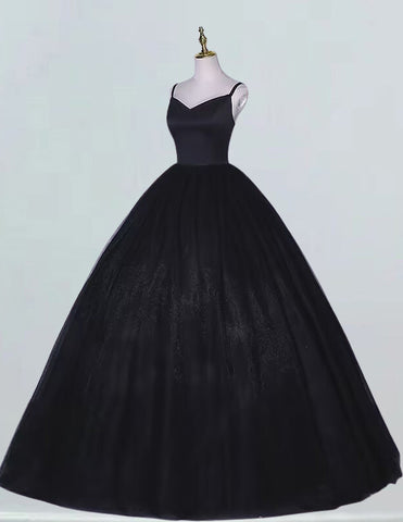 a black ball gown on a mannequin