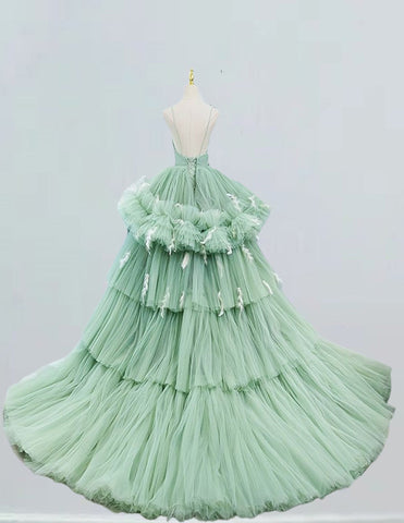 Light green spaghetti strap pleated long train ball gown