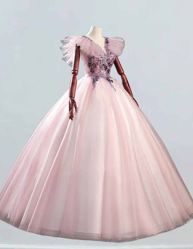 a mannequin dressed in a pink ball gown