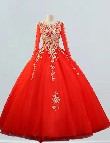 a red ball gown with gold appliques