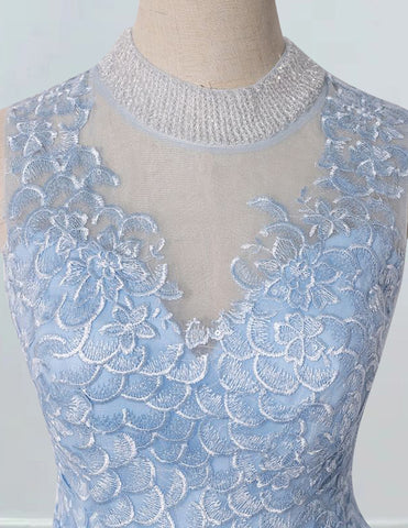 a light blue dress with a beaded neckline
