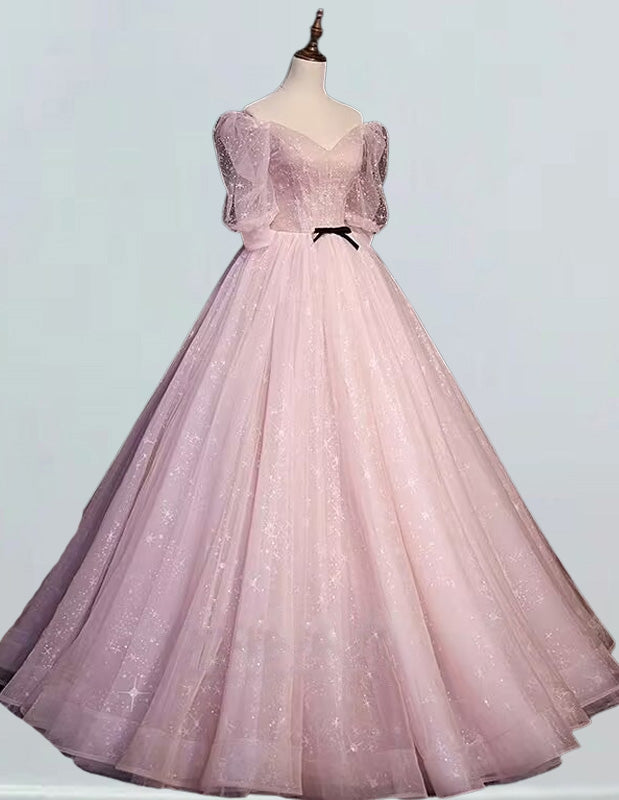 a pink ball gown on a mannequin