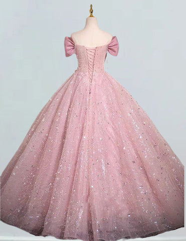 a pink ball gown on a mannequin