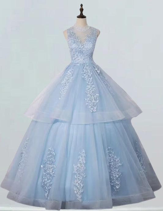 a light blue ball gown on a mannequin VIMYES