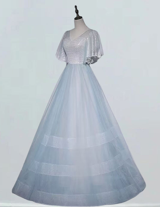 a dress on a mannequin with a white background