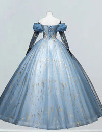 a blue dress with gold stars on it