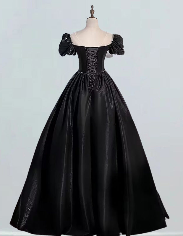 a black dress on a mannequin mannequin