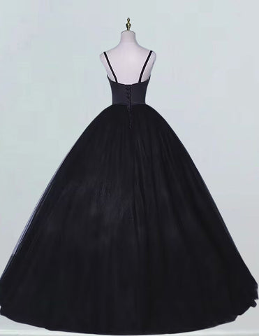 a black ball gown on a mannequin