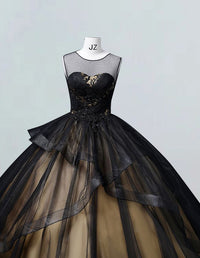Black tulle ball gown with gold lace appliques and scoop neckline