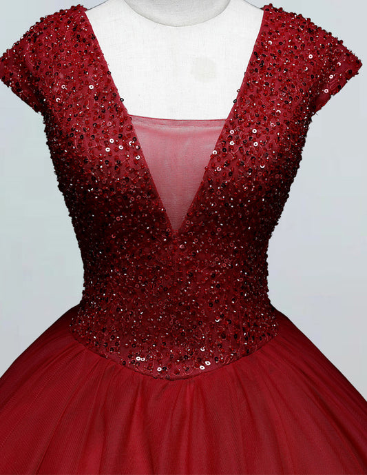 a red dress with sequins on it