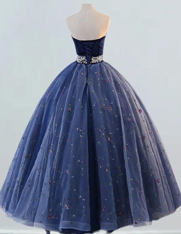 Elegant navy velvet strapless ball gown with pearl embellishments for prom or formal events1