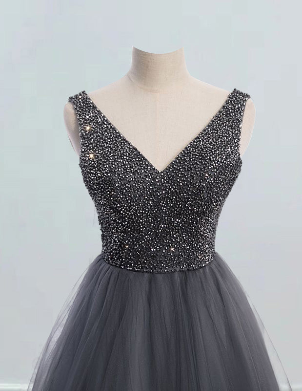 a black and silver dress on a mannequin