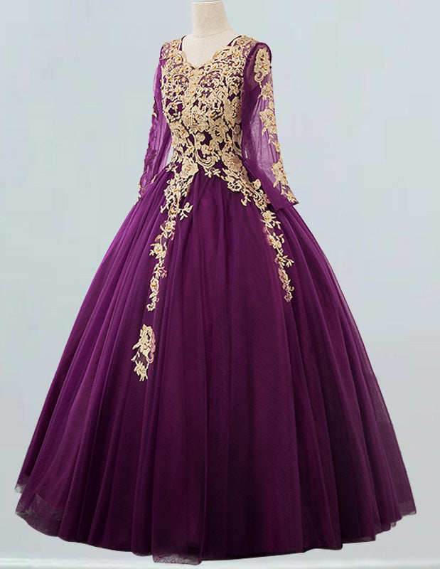 a purple dress with gold appliques on it