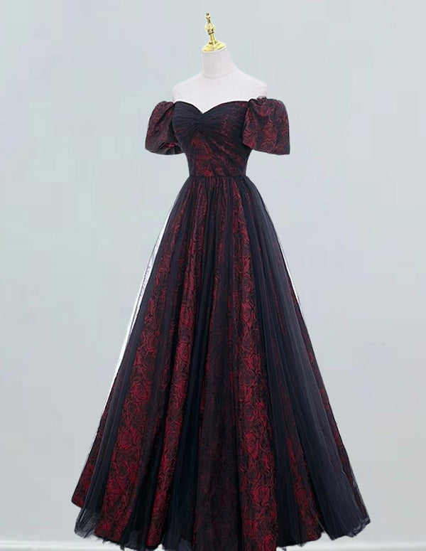 a black and red dress on a mannequin