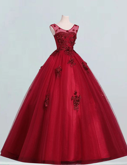 a red ball gown with flowers on it