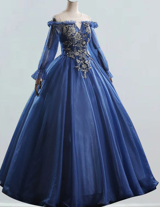 a blue ball gown on a mannequin VIMYES