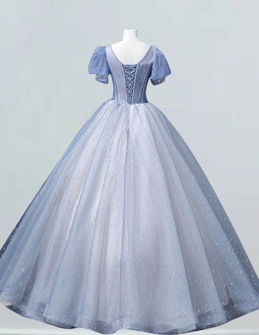 a white and blue ball gown on a mannequin