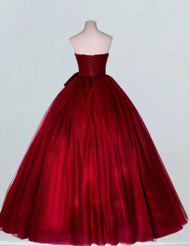 Burgundy strapless tulle ball gown for girls, perfect for prom and bridal events, featuring elegant and modest design with potential for off shoulder, cape, or corset variations3