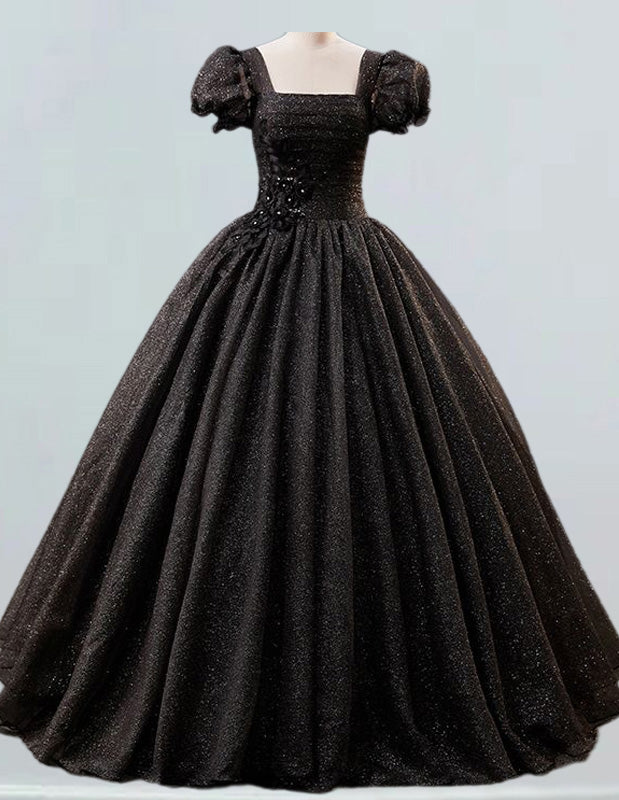 a black ball gown on a mannequin