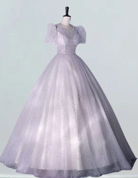 a white ball gown on a mannequin