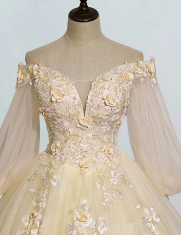 a dress on a mannequin with flowers on it