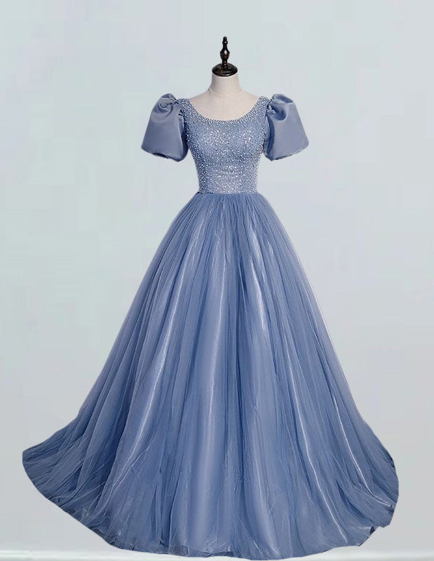 a blue ball gown on a mannequin