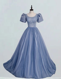 a blue ball gown on a mannequin