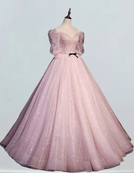 a pink ball gown on a mannequin VIMYES