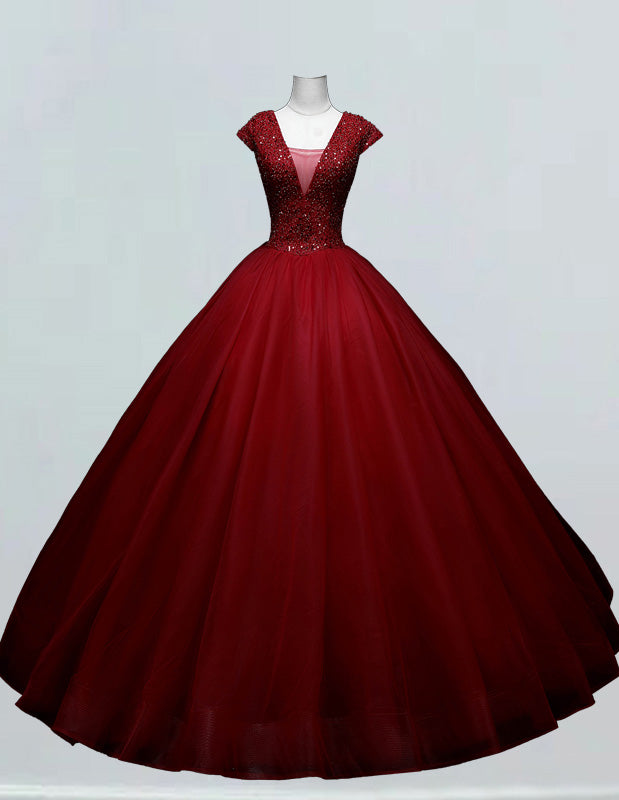 a red ball gown on a mannequin