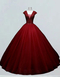 a red ball gown on a mannequin