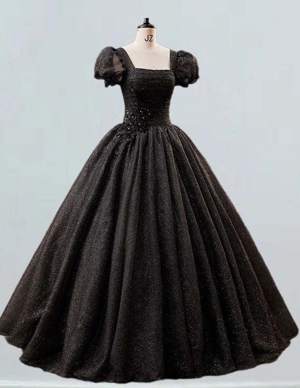 a black ball gown on a mannequin