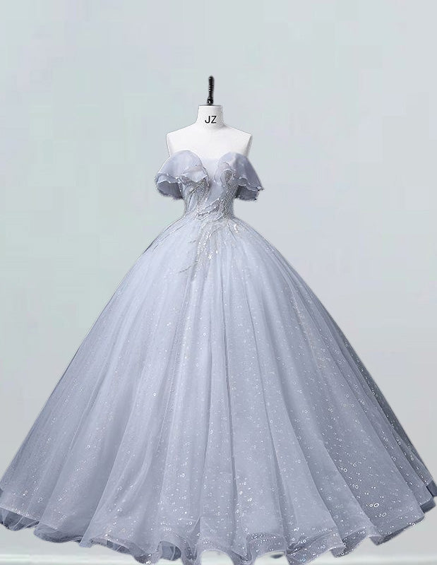 a white ball gown on a mannequin