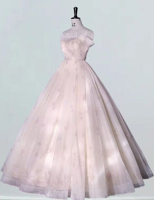 a white wedding dress on a mannequin