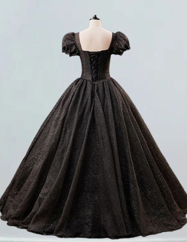 a black ball gown on a mannequin