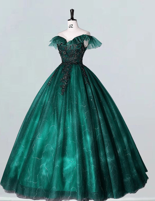 a green ball gown on a mannequin