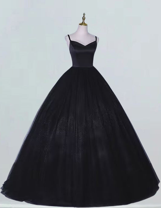 a black ball gown on a mannequin VIMYES