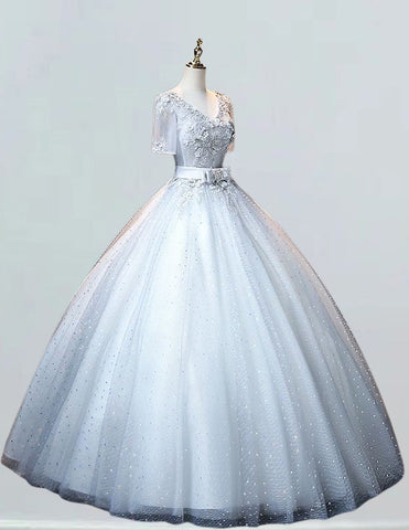 a white ball gown on a mannequin