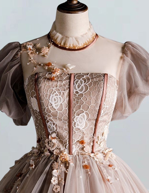 a dress on a mannequin with flowers on it