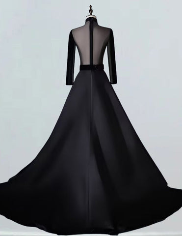 a dress on a mannequin with a sheer back
